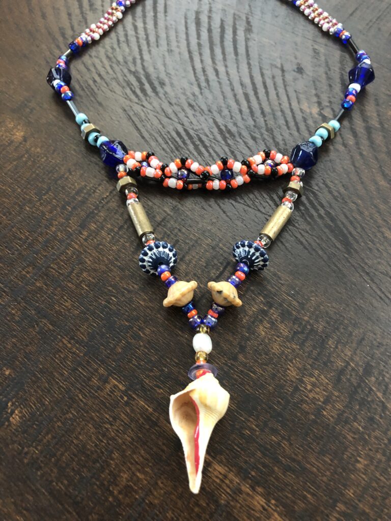 Beaded necklace with natural shell