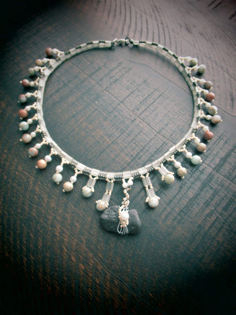 Beaded necklace with natural polished stone